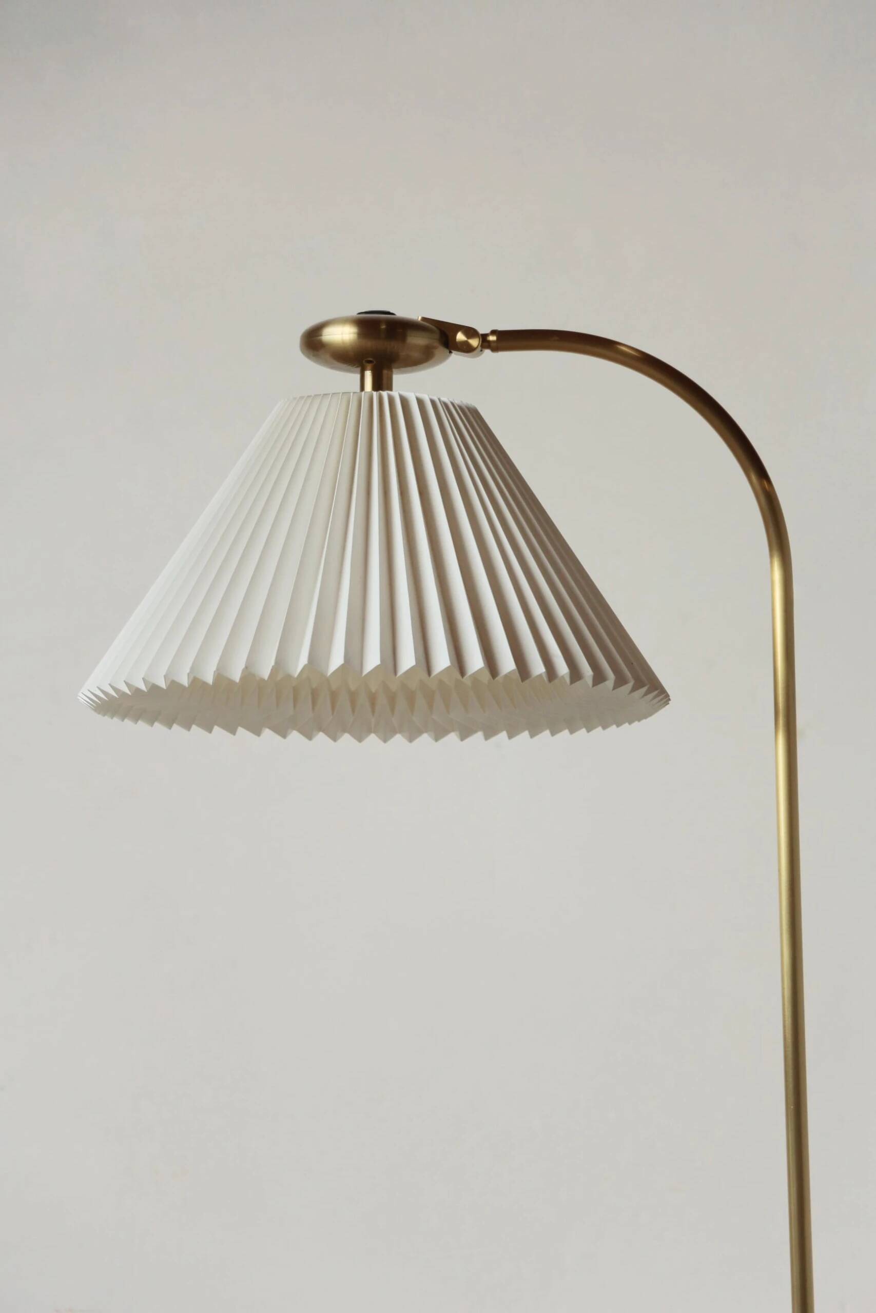 Le Klint 340 floor lamp in brass – design by Philip Bro Ludvigsen
