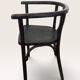 Curved black lacquered wooden armchair in Thonet style