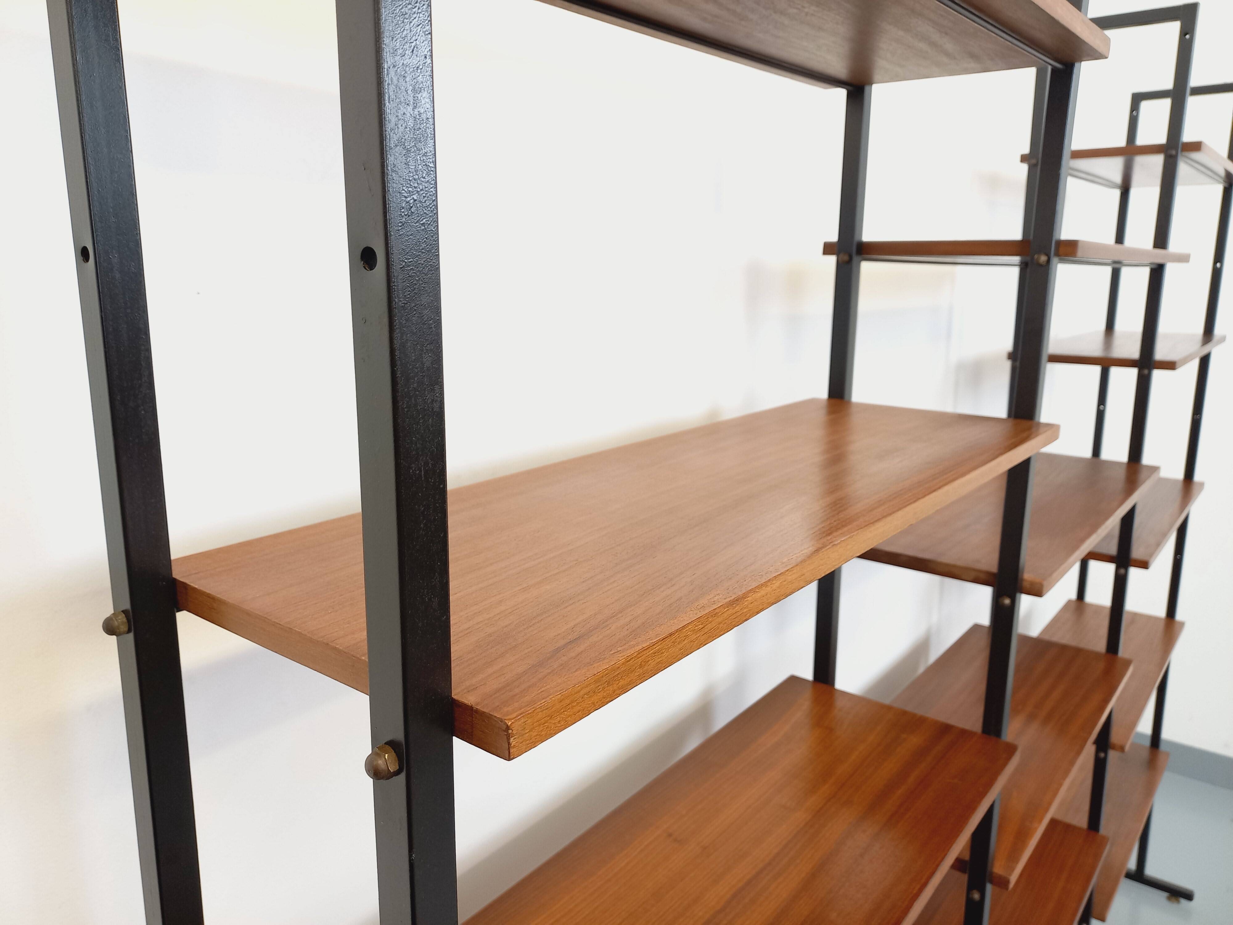Vintage Italian triple modular bookshelf in teak and metal.
