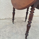 Round table with shutters with extension