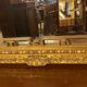 Wooden mirror with gilded stucco
