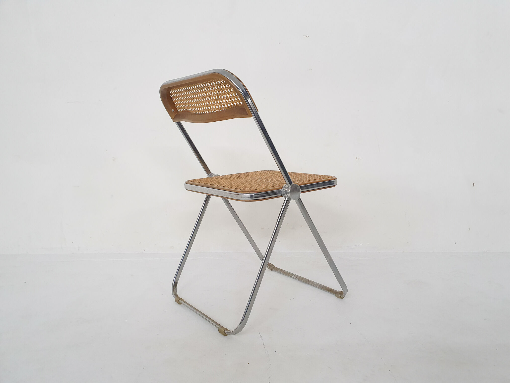 Webbing folding chair by Giancarlo Piretti for Castelli, model Plia, Italy 1967