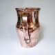 Old pitcher made of tinned copper