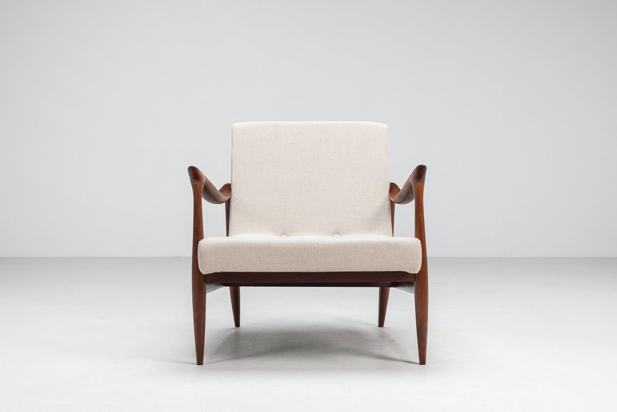 Sculptural Danish lounge chair in teak and fabric Denmark 1960