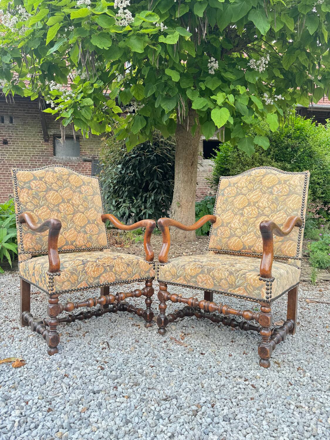 Pair of louis xiv period walnut armchairs, 17th century