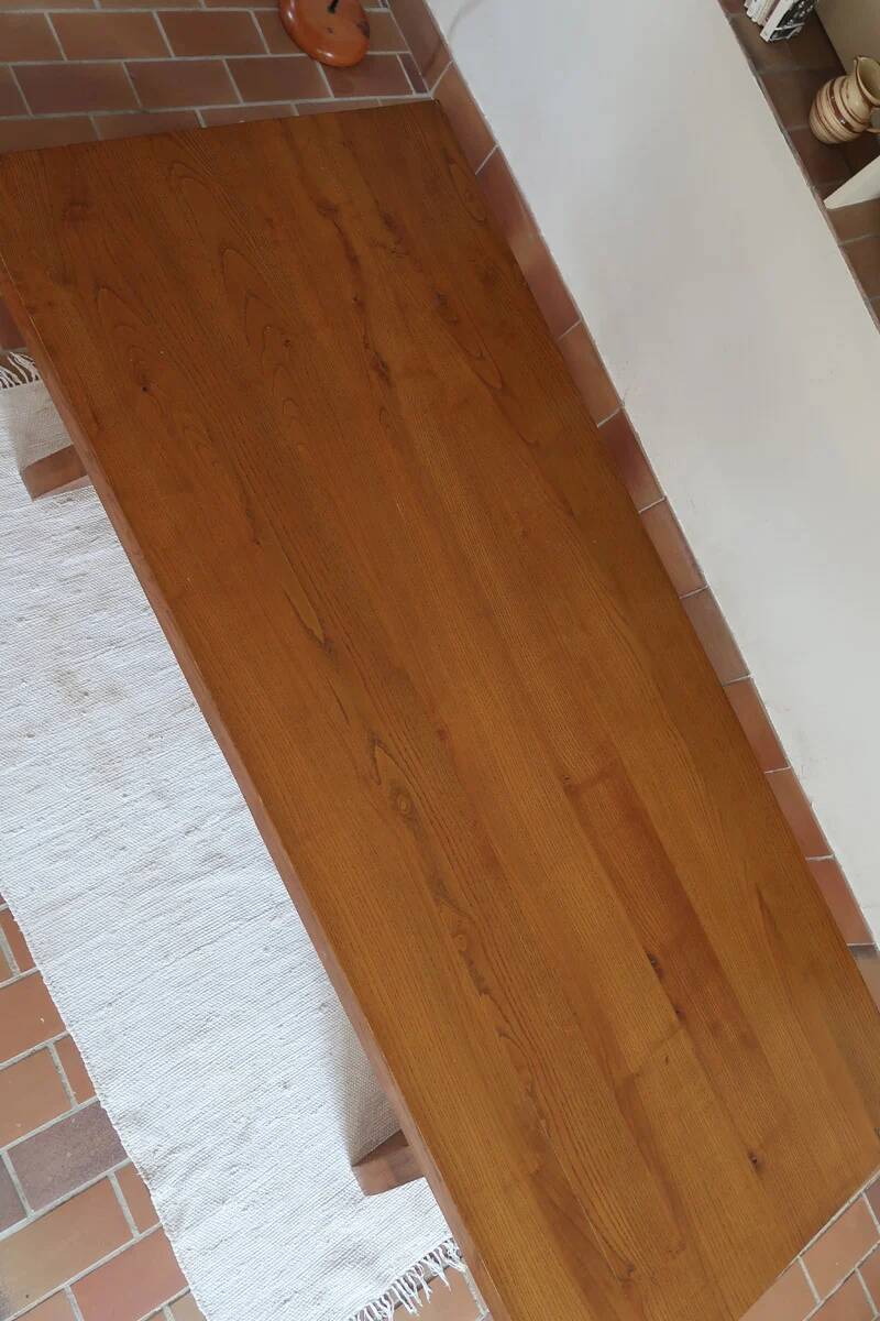 Solid wood dining table, sculpted brutalist base, 1960s.