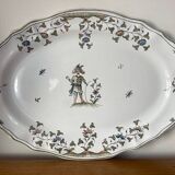 Large earthenware dish from Moustiers, signed Féret