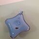 Enamelled sheet metal candlestick