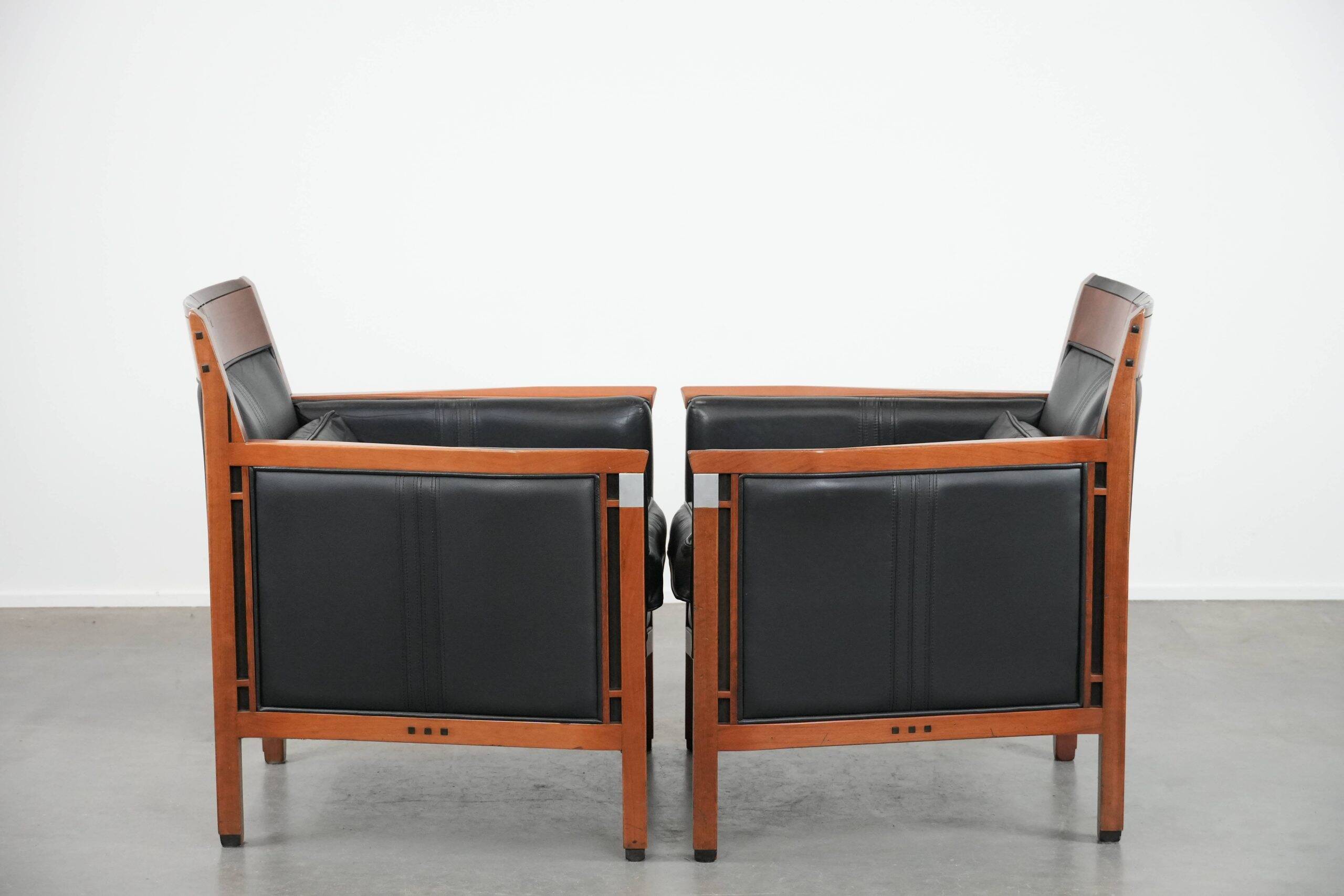 Set of  two black leather Art Deco design armchairs