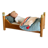 Wooden doll bed