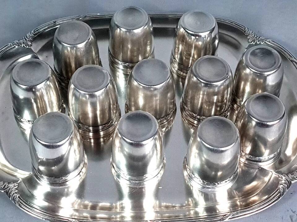 Antique silver-plated/gold liquor service with 12 goblets, tray + case.