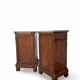 A pair of antique walnut bedside tables from the 1890s.