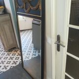 Trumeau louis XVI style mirror in black and gold stucco