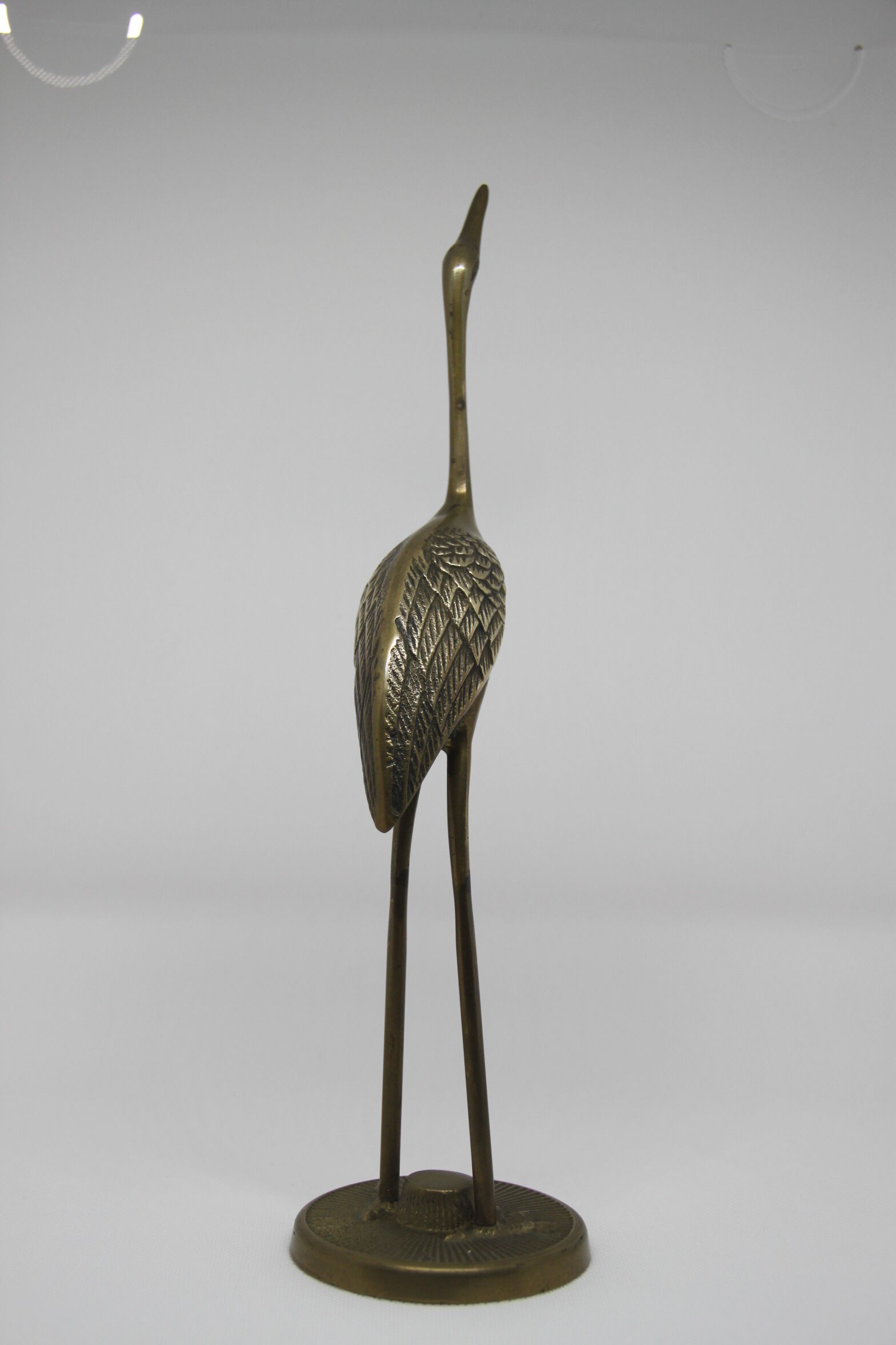 Brass heron