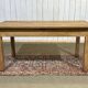 Extendable oak table from the 1930s with Gothic decoration.