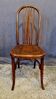 Curved wooden chair from the Fischel house.