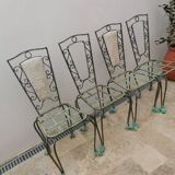 Wrought iron and marble table set with 4 chairs