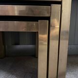 Trio of nesting tables, brass structures and smoked mirror tops