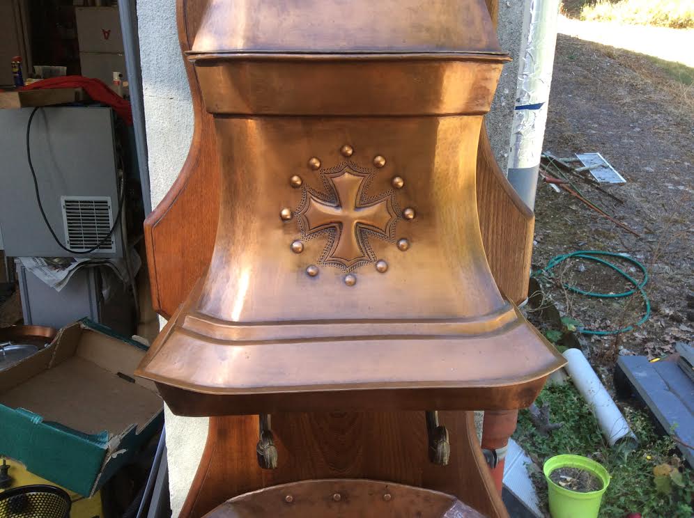 Copper fountain with wood support