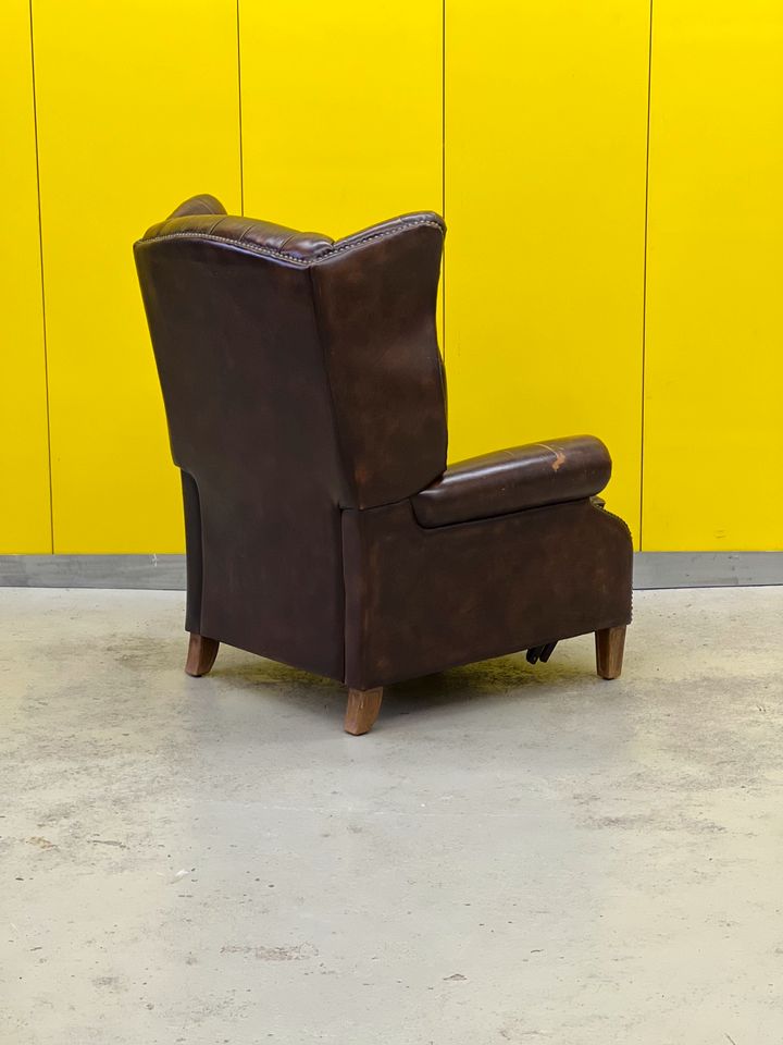 Brown vintage handmade chesterfield recliner armchair
