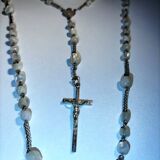 Old mother-of-pearl rosary in its egg box
