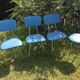 Lot of chairs and blue rockabilly stools