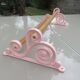 Old towel rack art deco in pink enamelled cast iron