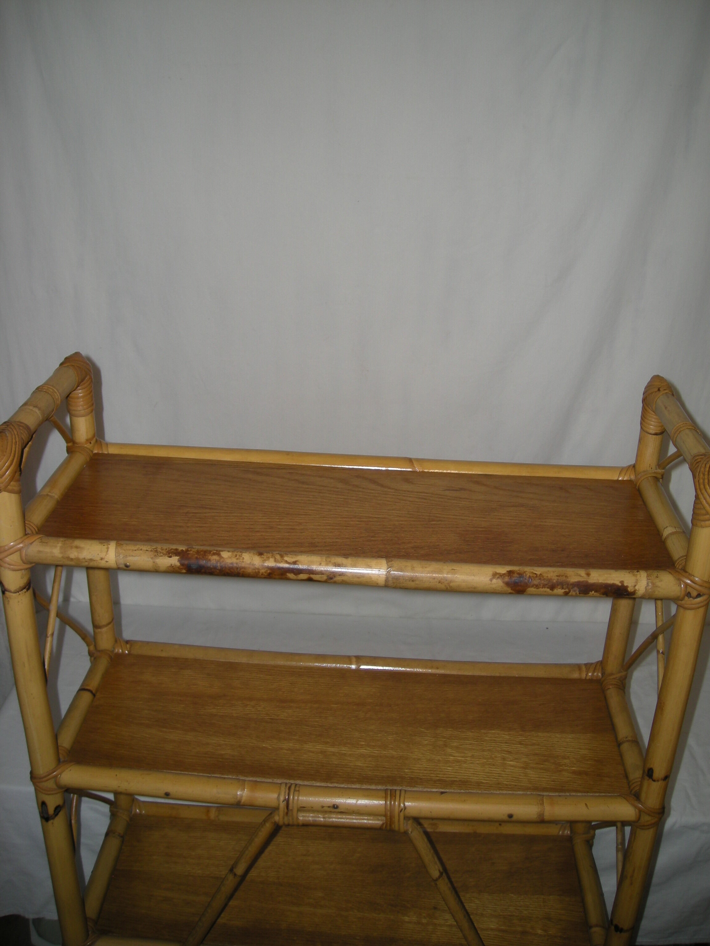Rattan bamboo shelf on feet from the 50s 60s