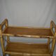 Rattan bamboo shelf on feet from the 50s 60s