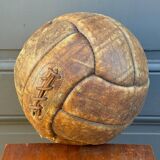 Mid-20th century leather soccer ball with visible stitching and beautiful patina