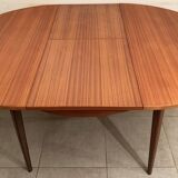 Scandinavian round teak dining table from the 60s extendable