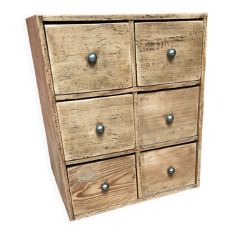 Old small furniture with hardware drawers