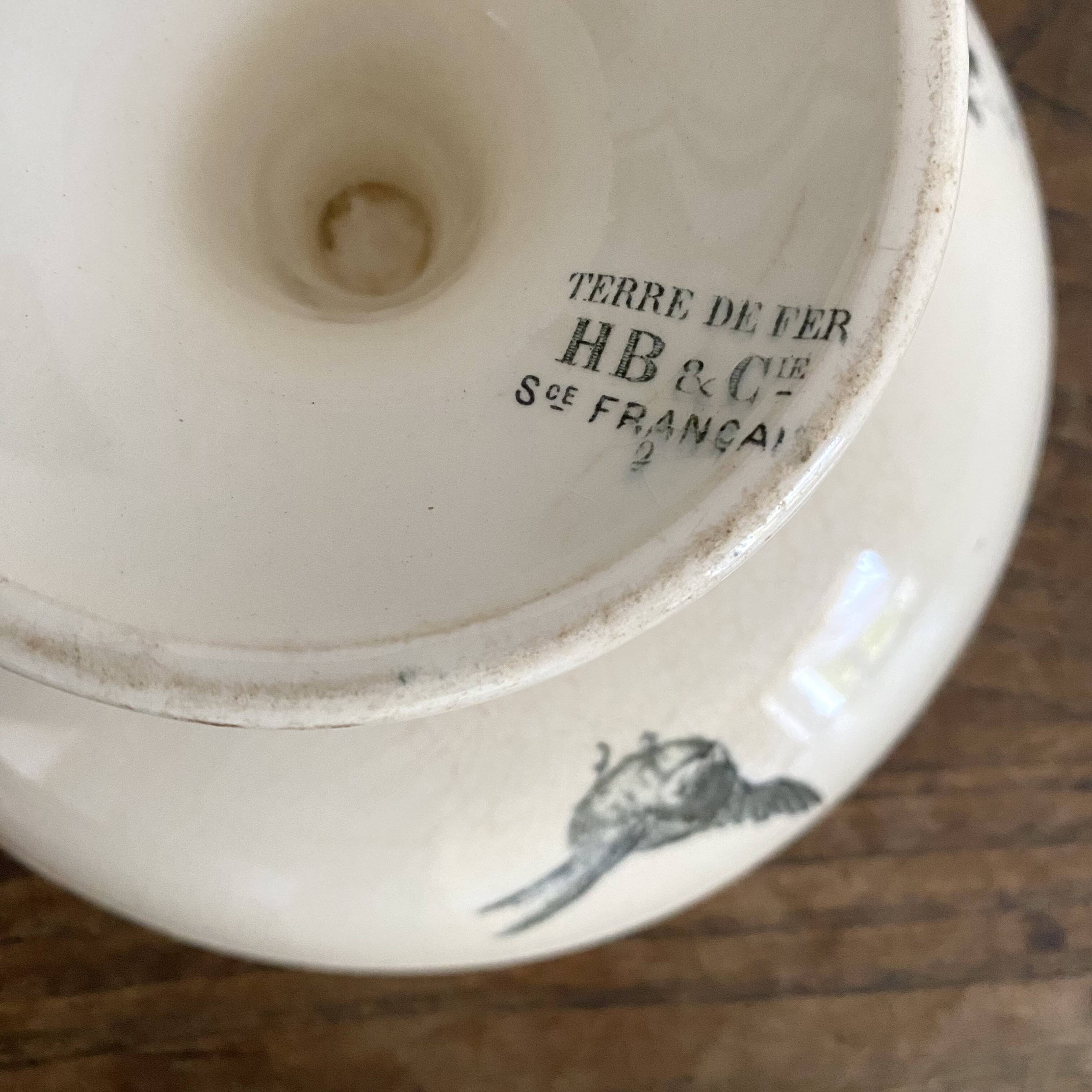 HB&Cie ironstone fruit bowl decorated with flowers, birds and butterflies