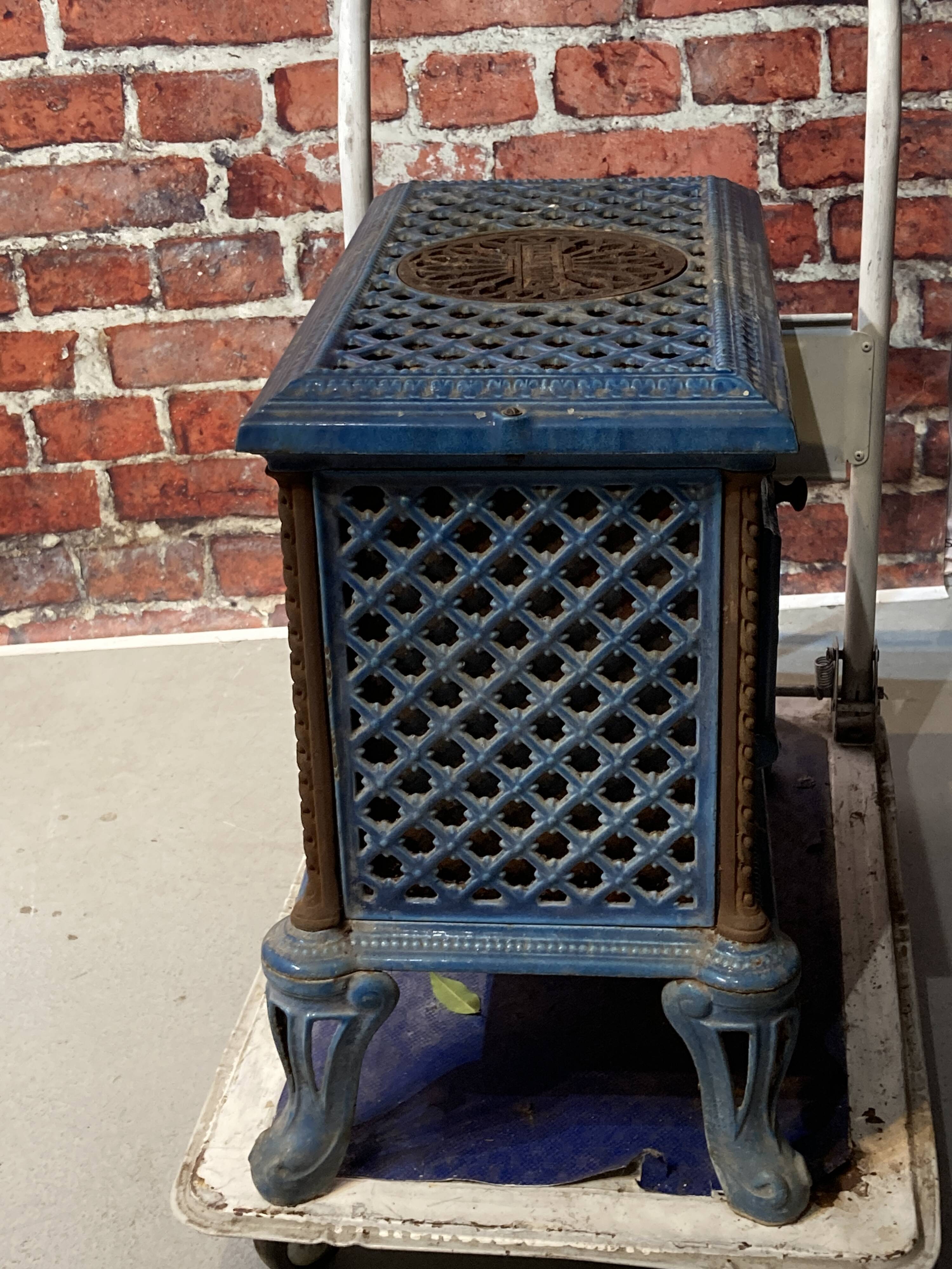 Cast iron and blue ceramic wood stove, from the Chauffette brand