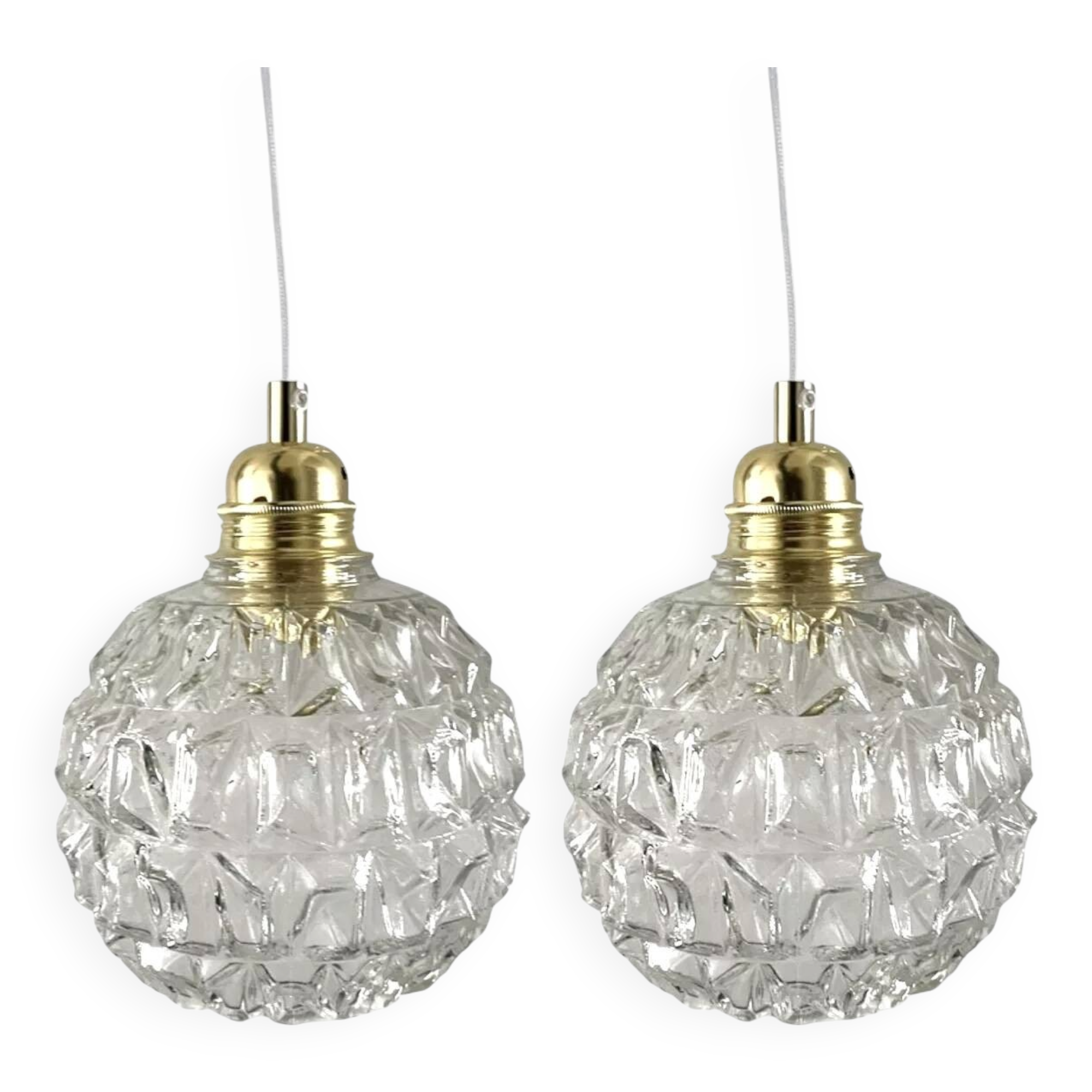 Set of two chiseled glass pendant lights