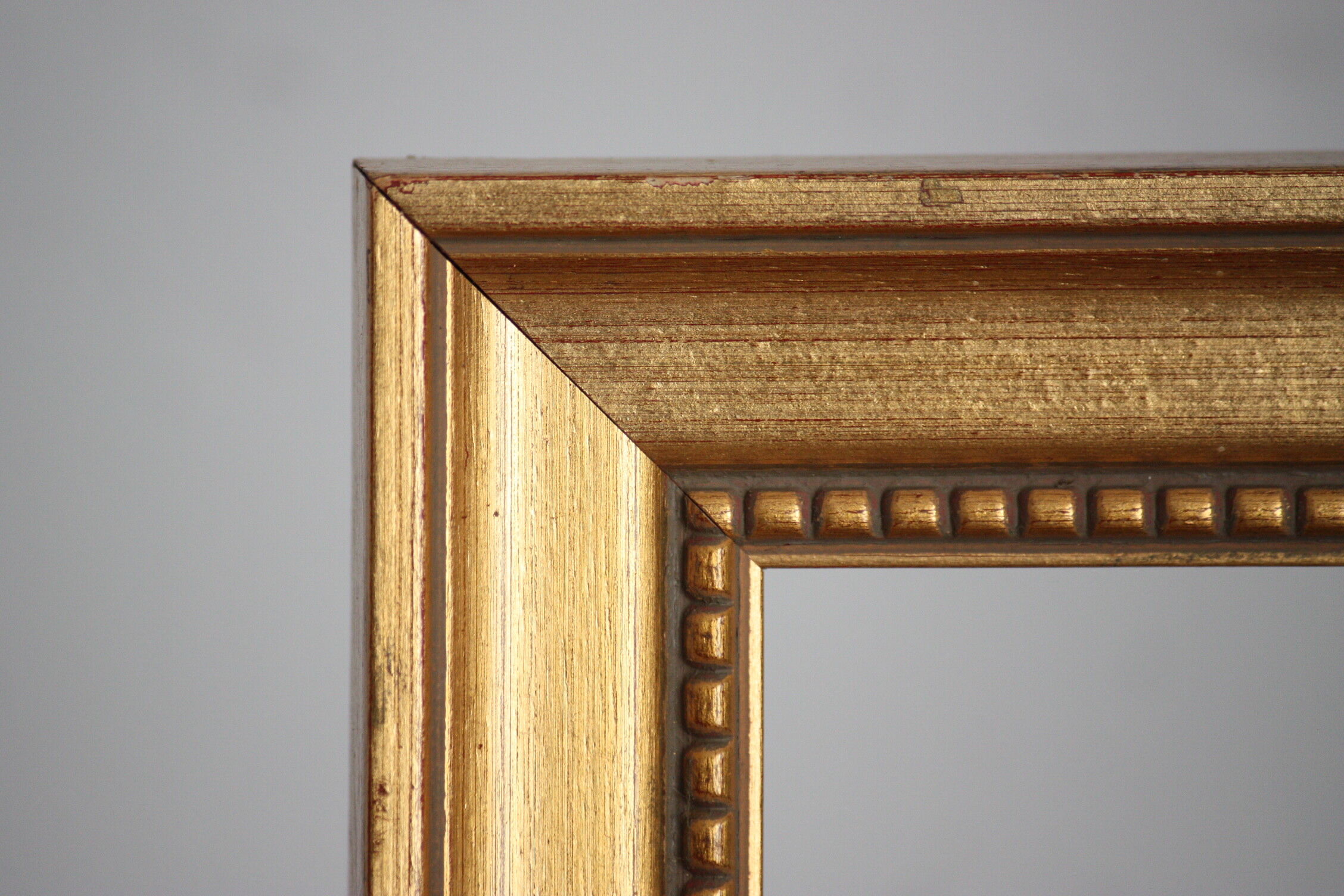 Carved and moulded gilded wood frame