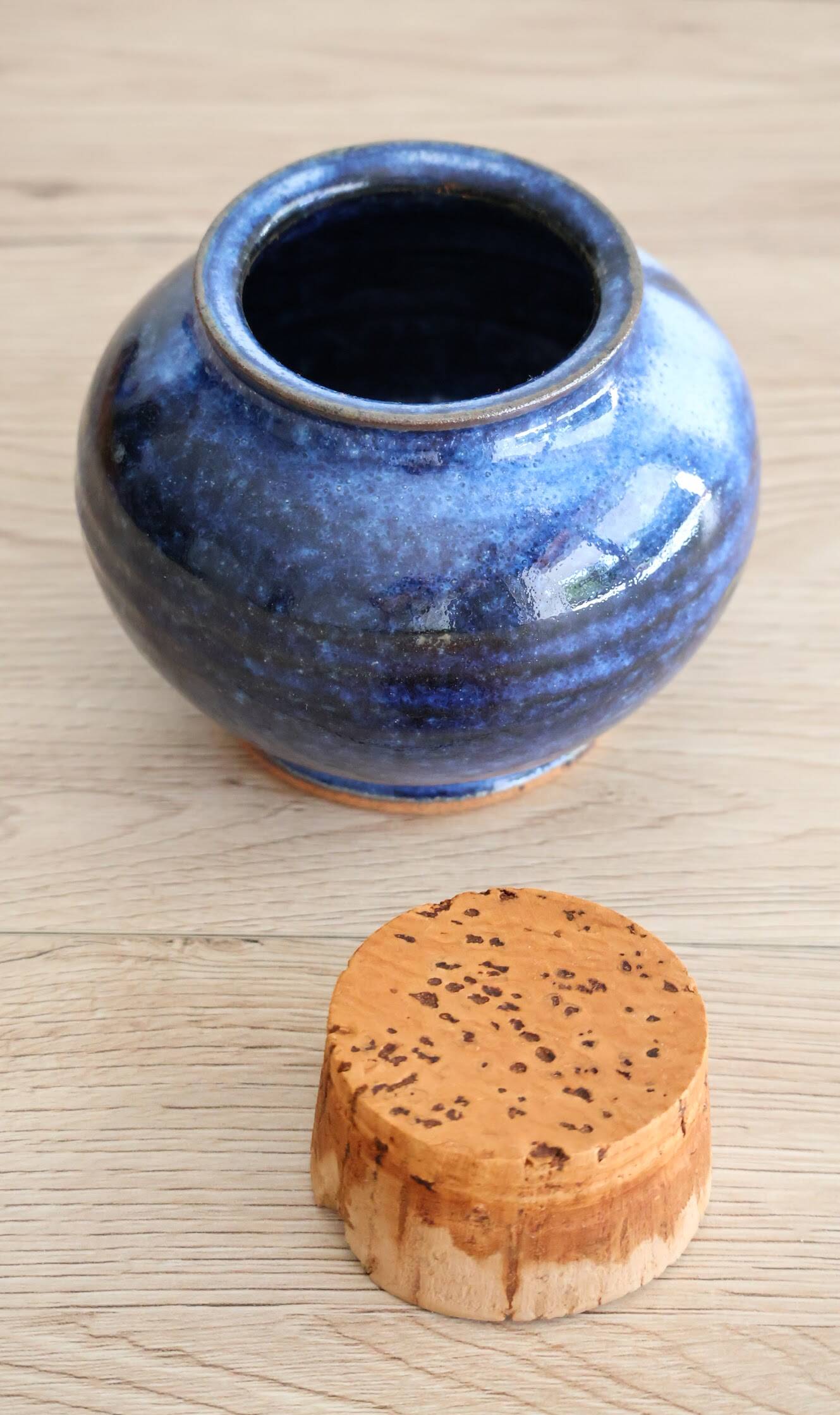 Blue glazed stoneware pot with cork stopper