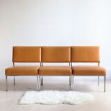 Modernist armchair in chromed metal and imitation leather, 50s/60s