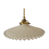 Serrated opaline suspension