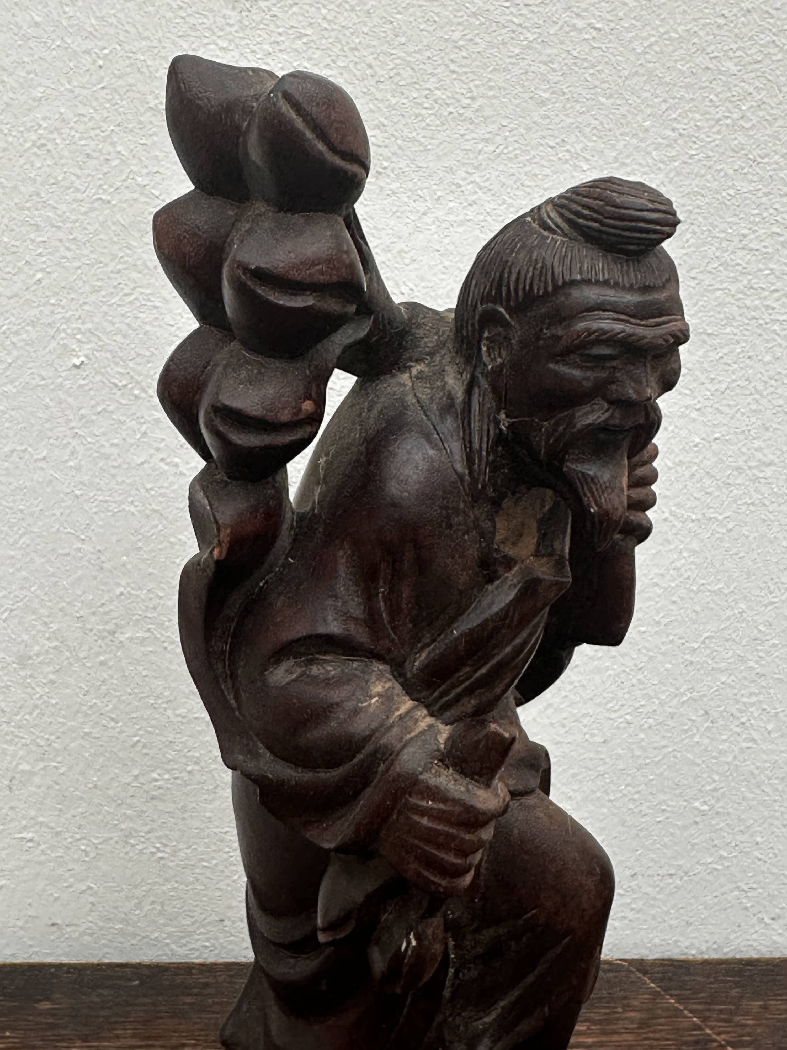 Carved wooden sculpture "Chinese peasant", early 20th century.