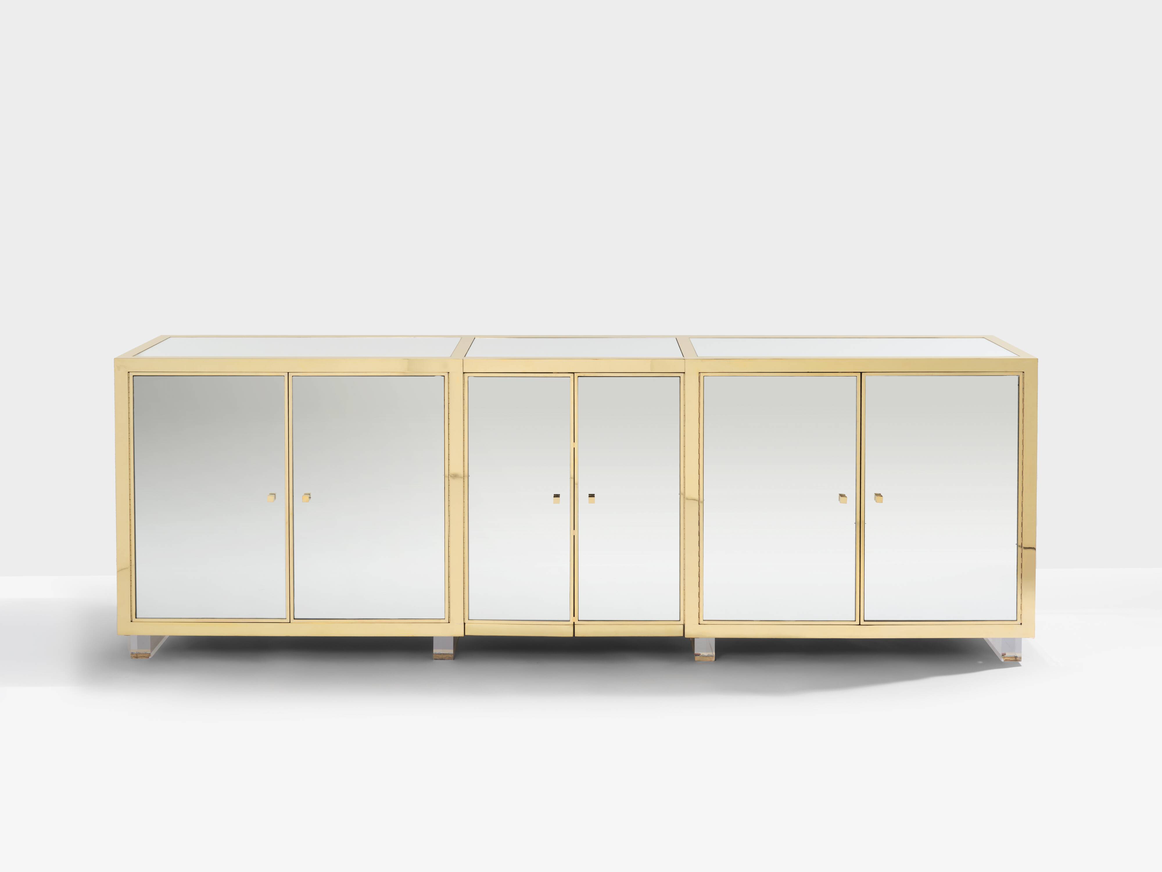Brass sideboard with mirror and plexiglass legs by Michel Pigneres, 1970