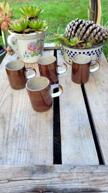 Vintage iridescent stoneware coffee mug.