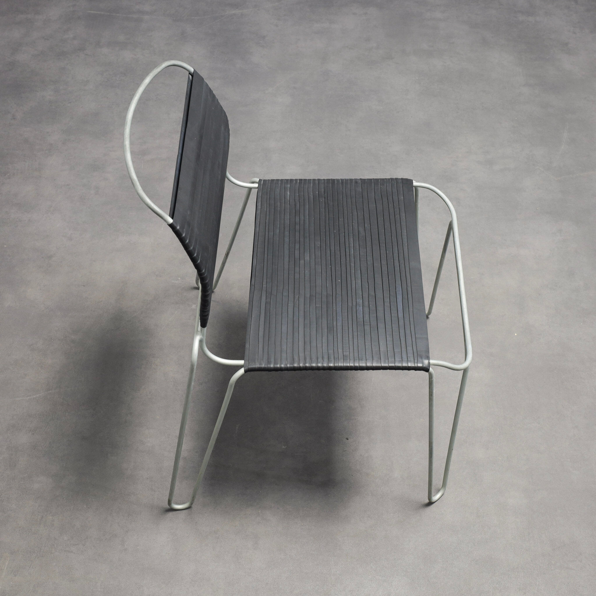 Rare pair of “Rubber Band” chairs by Tom Dixon