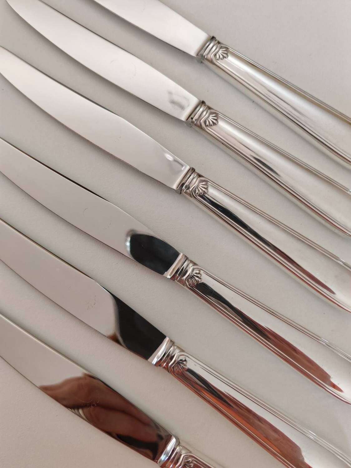 Silver-plated metal cheese knives