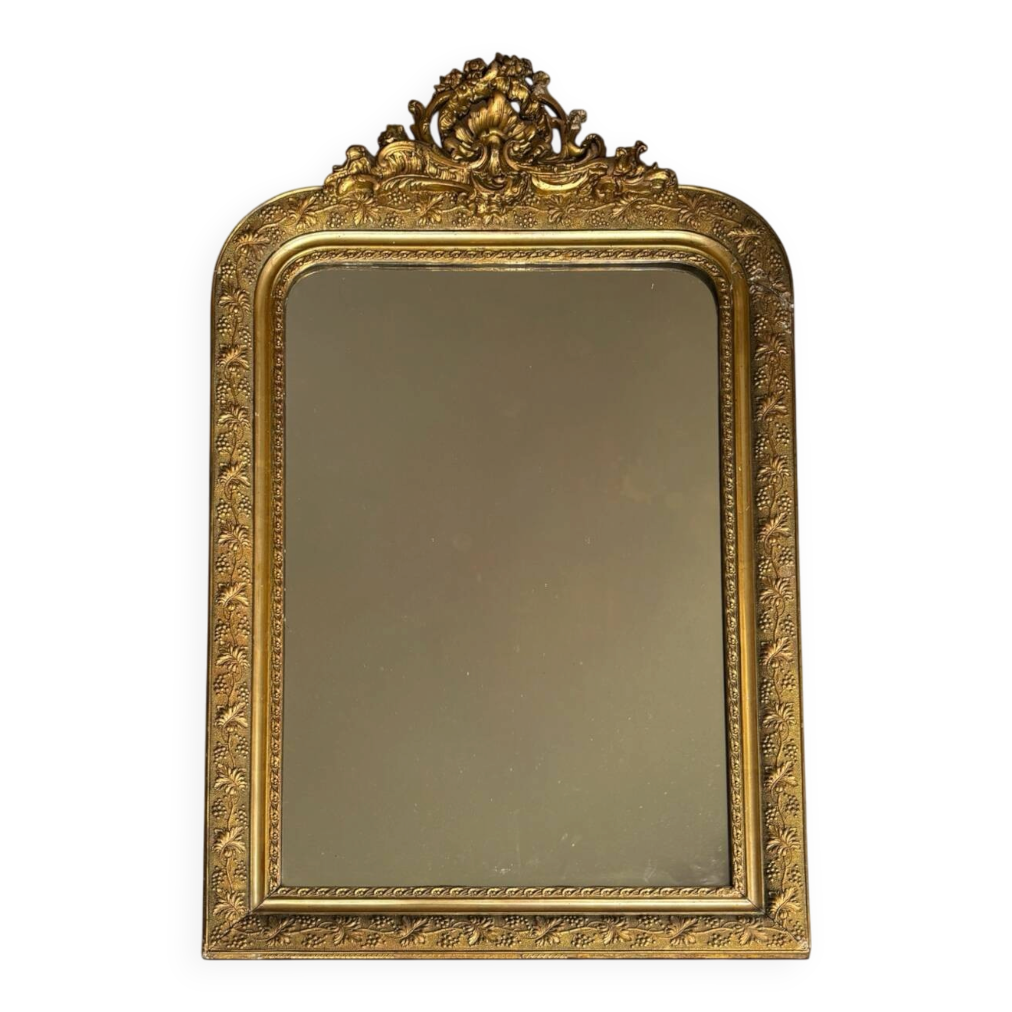 Golden mirror with a pediment from the early 20th century.