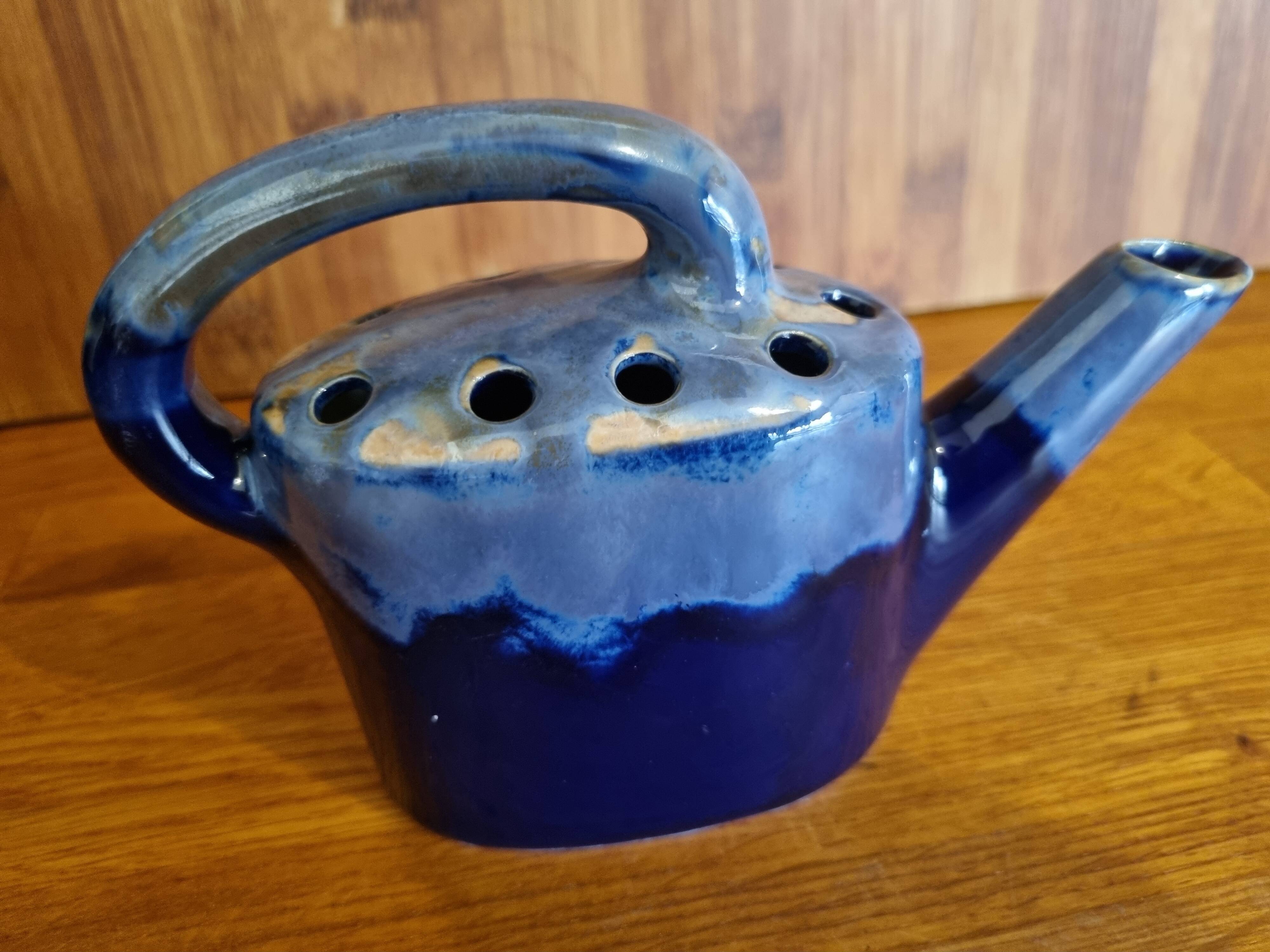 Blue flamed stoneware watering can flower stand