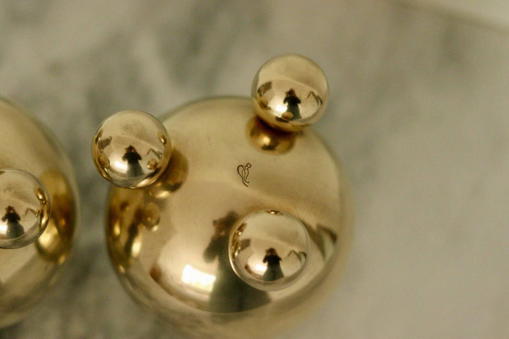 Pair of mid-century Swedish heavy brass candle holders