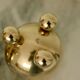 Pair of mid-century Swedish heavy brass candle holders