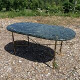 Oval coffee table in veined green marble