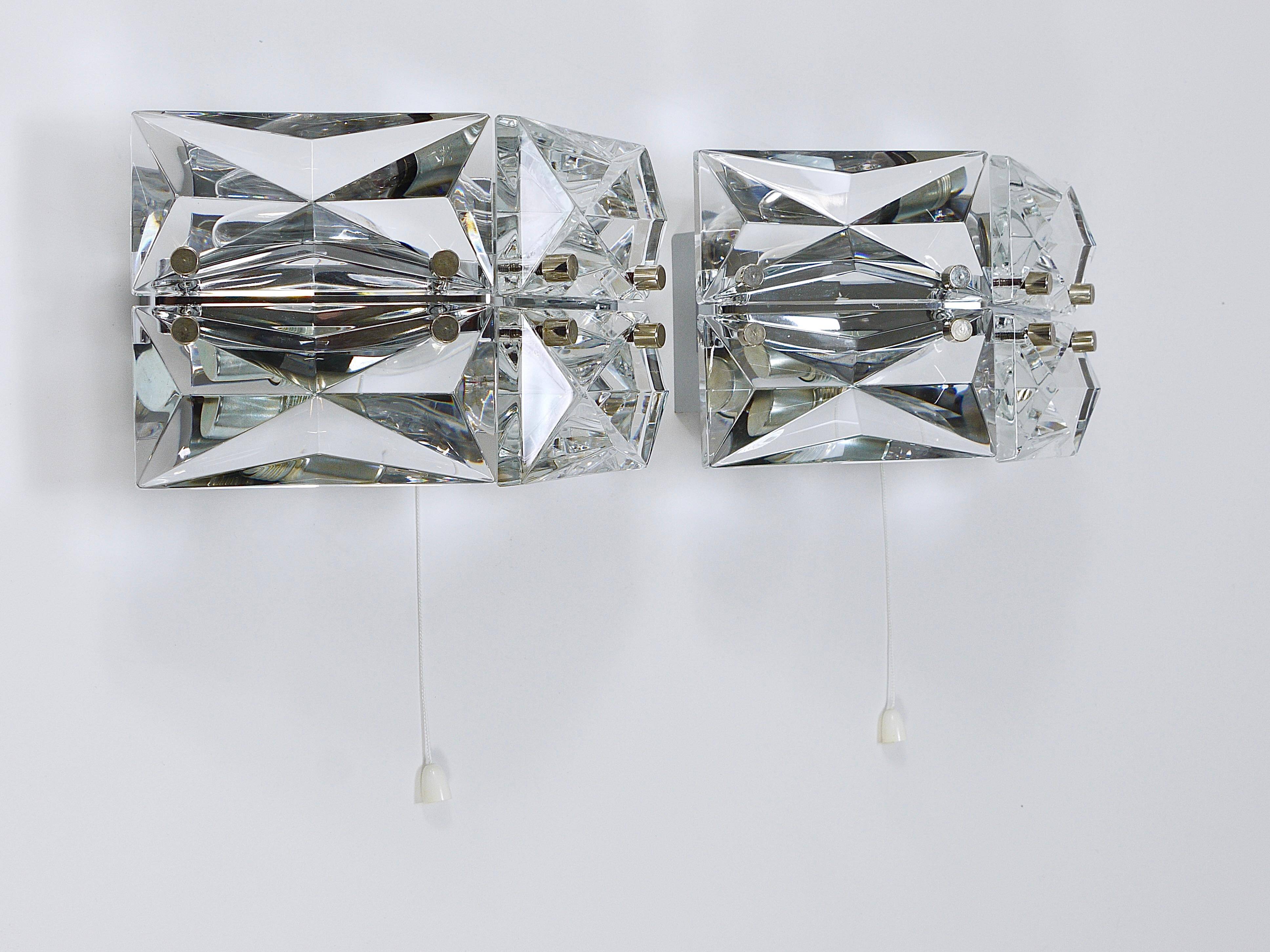 Pair of wall sconces in faceted crystal and chrome / prism glass wall lamps by Kinkeldey